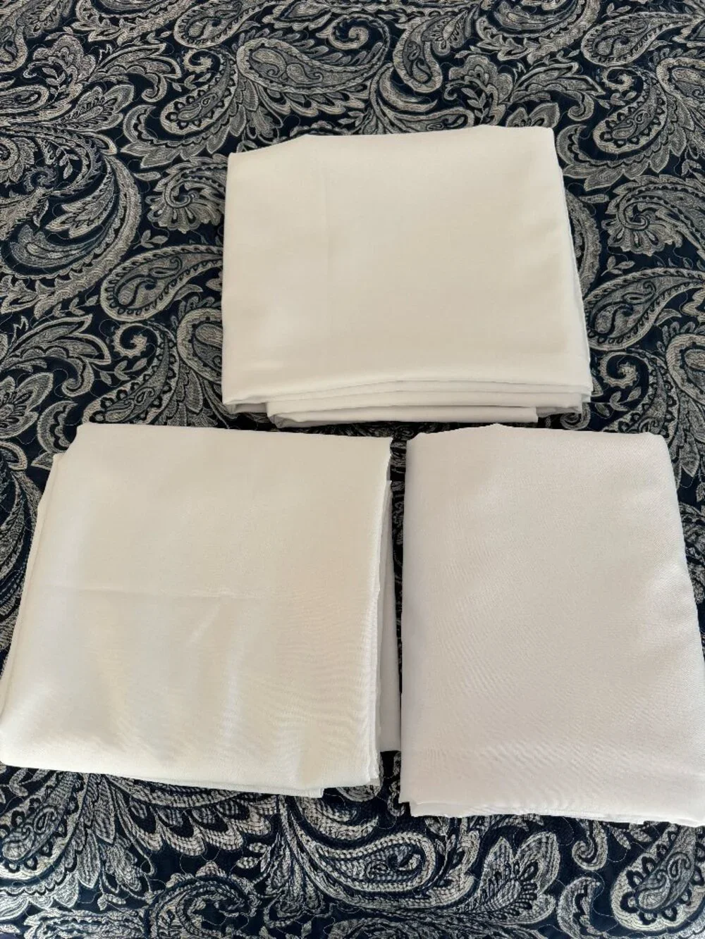 Three solid white rectangular tablecloths for 8 foot tables